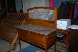 A Mahogany framed light and darkwood chequered strung Washstand having a pair of opposing doors,