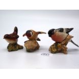 A Beswick Bullfinch and Wren (chip to beak) and a Royal Worcester Goldfinch.