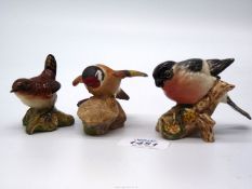 A Beswick Bullfinch and Wren (chip to beak) and a Royal Worcester Goldfinch.