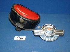 A Chrome Morris car badge 737876, and a 'D' shape vintage car tail light by Butlers.