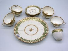 A small quantity of fine old bone china tea ware with green and gilt stylised leaf borders an rims