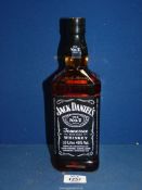 A 70 cl bottle of Jack Daniels Tenessey Sour Mash Whisky.
