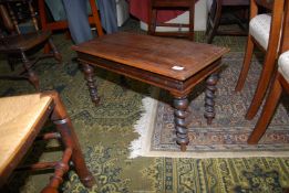 A rectangular Pine topped Table standing on Mahogany mirrored twist legged base,