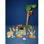 A tinplate climbing monkey, German wooden musical angels, Timpo dog etc.