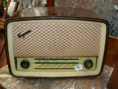 A vintage Ferguson Bakelite Radio, one knob missing, 18" wide x 7" deep x 13" high.