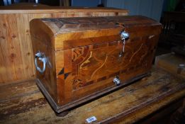 An 18th century German parquetry trunk of small dimensions beautifully inlaid and cross banded