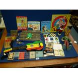 A quantity of toys and games including Chad Valley quoits, Hornby boxed railway track etc.