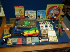 A quantity of toys and games including Chad Valley quoits, Hornby boxed railway track etc.