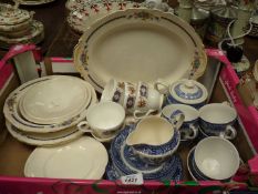 A quantity of china including blue and white willow pattern tea ware, part Royal Sutherland tea set,