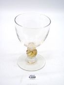 A hand blown glass Goblet with bulbous twist stem in faint gold shade with snapped pontil and
