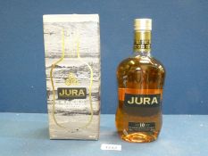 A 70 cl bottle of Jura 10 year Single Malt Whisky, boxed.