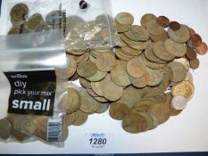 A quantity of old and worn British and foreign coins