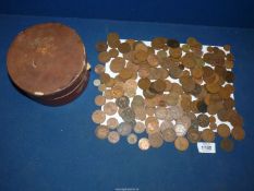 A tub of pre-decimal pennies and halfpennies.