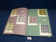 A Scrap book of many mint sheets of Stamps dated 1971-1974.