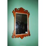 An old carved mahogany frame Wall Mirror with gilding to the inner and outer edges of the frame,