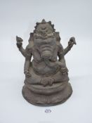 A large speculative Nepalese bronze figure of Ganesh (old but otherwise undated), 11 1/2" tall.