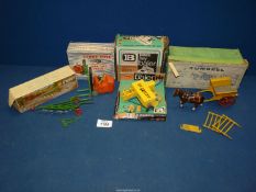 A Britains No.4F Tumbrel Cart, Plough and Baler and a Dinky No.401 Forklift Truck, all boxed.