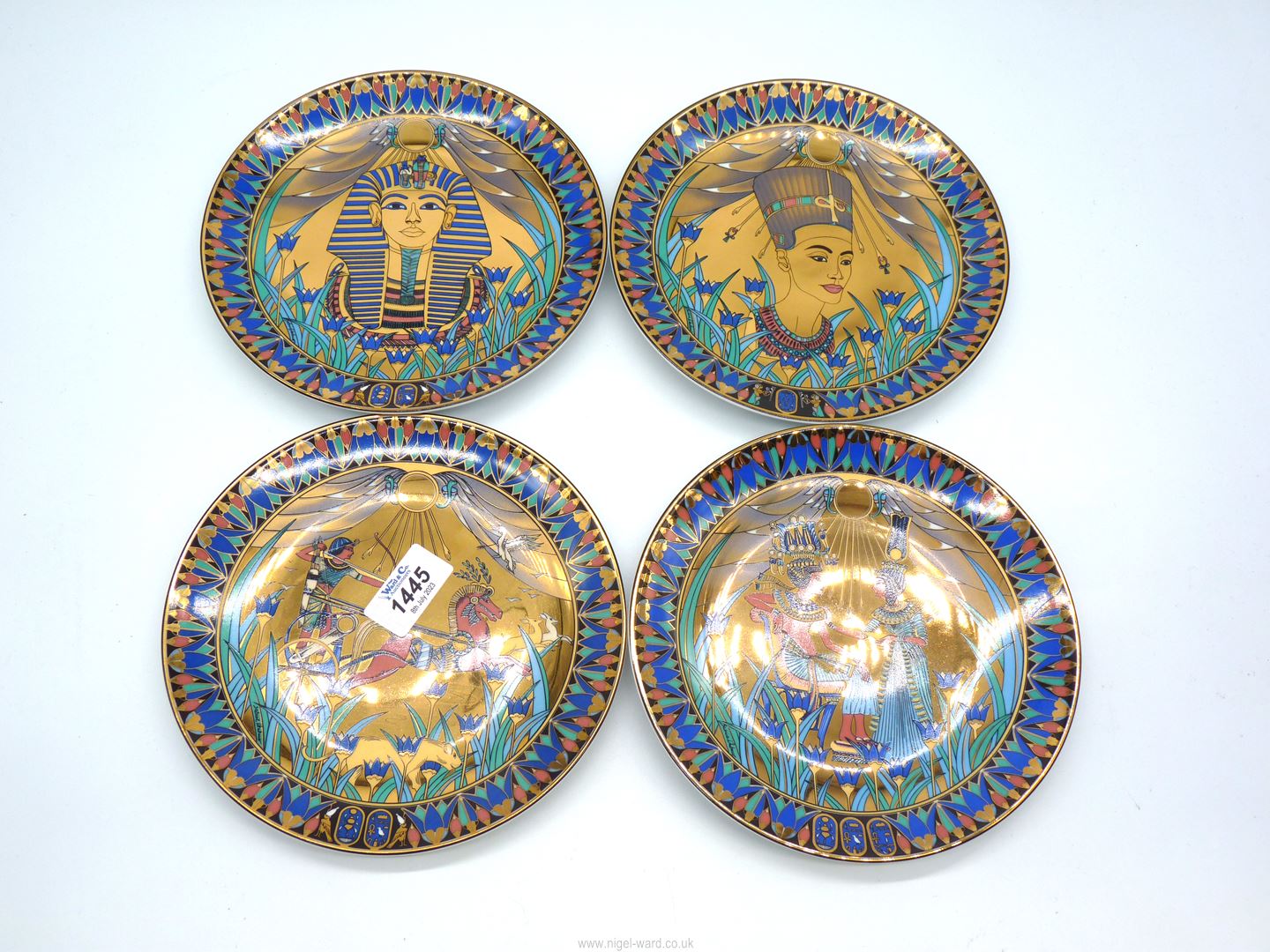 Four Royal Worcester Legend of the Nile porcelain plates; Mask of Tutankhamun, Nefertiti,