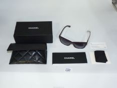 A pair of lady's Chanel sunglasses having burgundy frame( ref no. 5380 c.