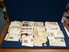 Stamps, to include a box of first day covers and postal covers.