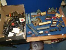 A quantity of '00' gauge rolling stock, track and buildings, Hornby, Tri-ang etc.