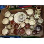 A quantity of Devonware to include cups, saucers, jugs, vases, plates, etc.