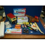 A quantity of toys including model planes, wooden crane etc.