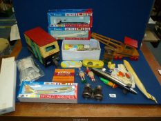 A quantity of toys including model planes, wooden crane etc.