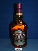 A 70 cl bottle of Chivas Regal 12 year old blended Scotch Whisky.