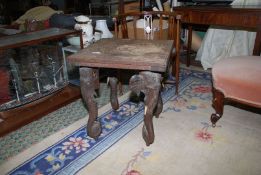 An Eastern hardwood design square Occasional Table standing on elephant head legs,