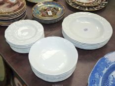 A quantity of Wedgwood 'Strawberries & Vine' white china including soup plates,