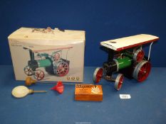 A boxed Mamod steam Tractor with steering rod, scuttle, etc.