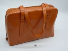 A Radley of London orange leather handbag