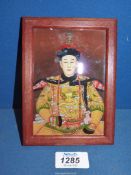 A Chinese reverse painting on glass of an Emperor, 4 1/2'' x 6''.