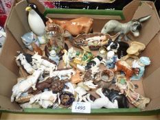 A quantity of small china items including Wade, Beswick, Country Artists etc, some a/f.