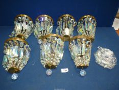 Seven 20th century crystal and brass drop Lustre light fittings, all complete plus extras.