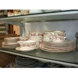 A quantity of Royal Worcester 'Royal Garden' dinnerware including dinner and dessert plates,