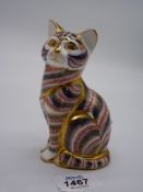 A Royal Crown Derby Cat paperweight with silver stopper.