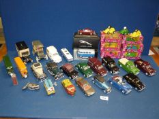 A quantity of model cars including boxed "Bump & Go" cars, tin plate cars,