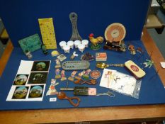 A quantity of miscellanea including cut-out figures, magic lantern slides, piece of quartz, etc.