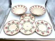 A quantity of collectable Michael Mosse bowls and plates in Fuchsia pattern.