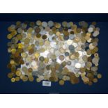 A quantity of foreign coins including Belgian Francs, Forint, Dinar etc.