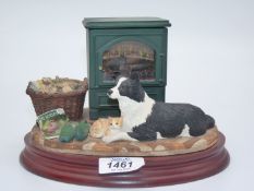 A Border Fine Arts "Warm Friends" with a light up stove and batteries or adapter powered (all