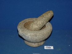 An unusual vintage granite rock pestle and mortar.