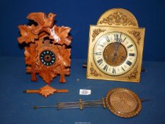 A Gustav Becker clock movement with pendulum together with a Cuckoo clock case.