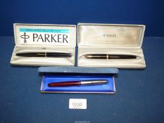 Three boxed Parker pens, one with 14k nib.