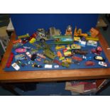 A quantity of die cast vehicles including Dinky, Corgi and Lesney including large army jeep, etc.