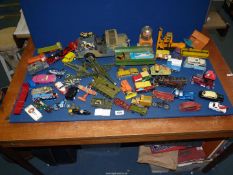A quantity of die cast vehicles including Dinky, Corgi and Lesney including large army jeep, etc.