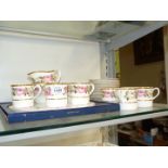 A part Royal Worcester 'Royal Garden' coffee service with coffee cans, saucers, plates, milk jug,