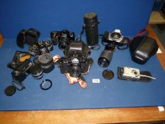A quantity of cameras including Yashica FX-D, Chinon CM-3 in Pratica case, Canon EOS 300,